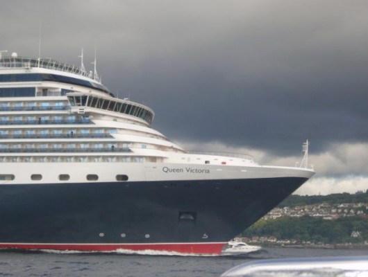 The Quen Victoria heads down the Clyde