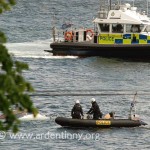 MOD Police examine upturned craft