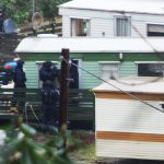 Armed police raid local caravan site