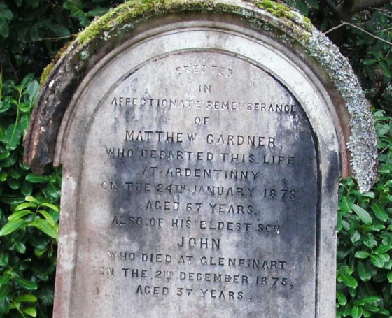 The gravestone at Kilmun of a former Ardentinny postmaster Matthew Gardener.